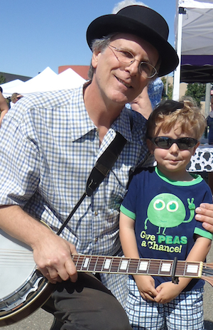 Here is a picture of one of my biggest little fans, Des. He knows all the songs and has no problem asking for all his favorites. He and his family come to the Country Club Plaza Farmers Market and it’s always great to see them.